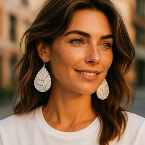 ❄️ Plunder | Spike Earrings - Sparkly Silver Double-sided volleyball 3.5” drop.